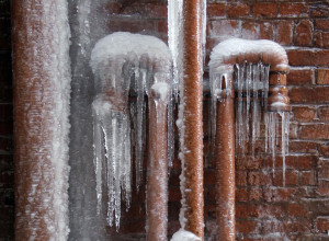 Ice coats leaking pipes (AP Photo/Mark Duncan)