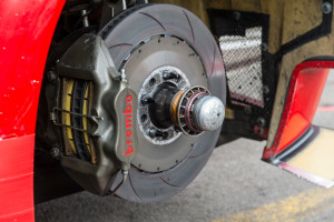 Zolder, Belgium - April 21, 2013: Brembo disc brake on a AF Corse Ferrari 458 Italia GT3 race car in the pit lane before the race. The car is participating in the 2013 FIA GT championship.