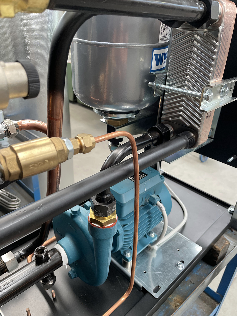 Image showing components of a temperature control unit, for which scheduled maintenance is essential for operational continuity. 